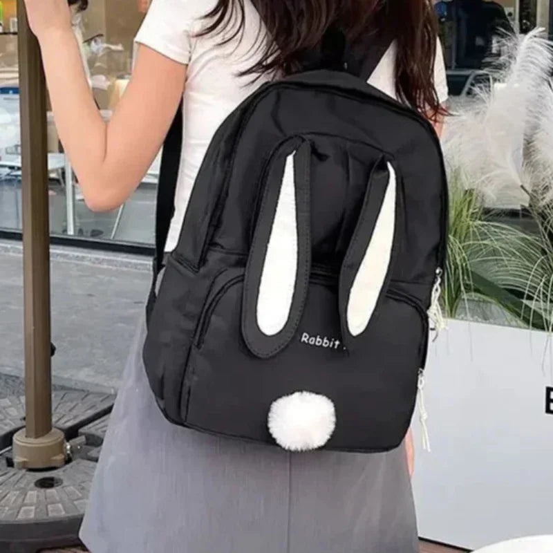 Mochila Escolar de Nylon com Estampa de Coelho Lenogue