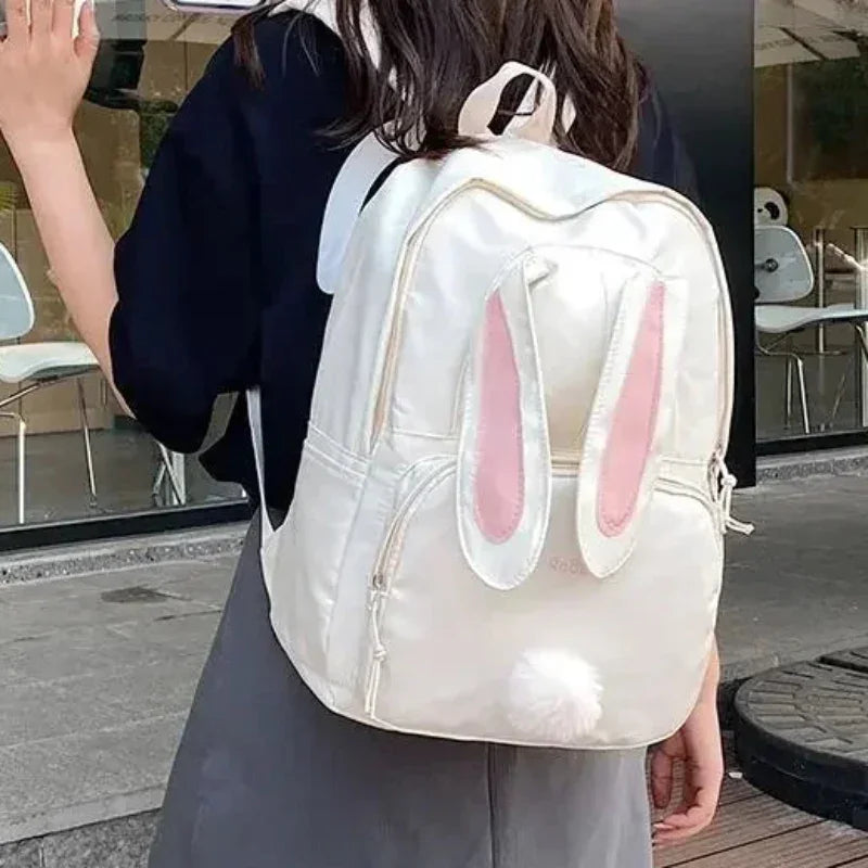 Mochila Escolar de Nylon com Estampa de Coelho Lenogue